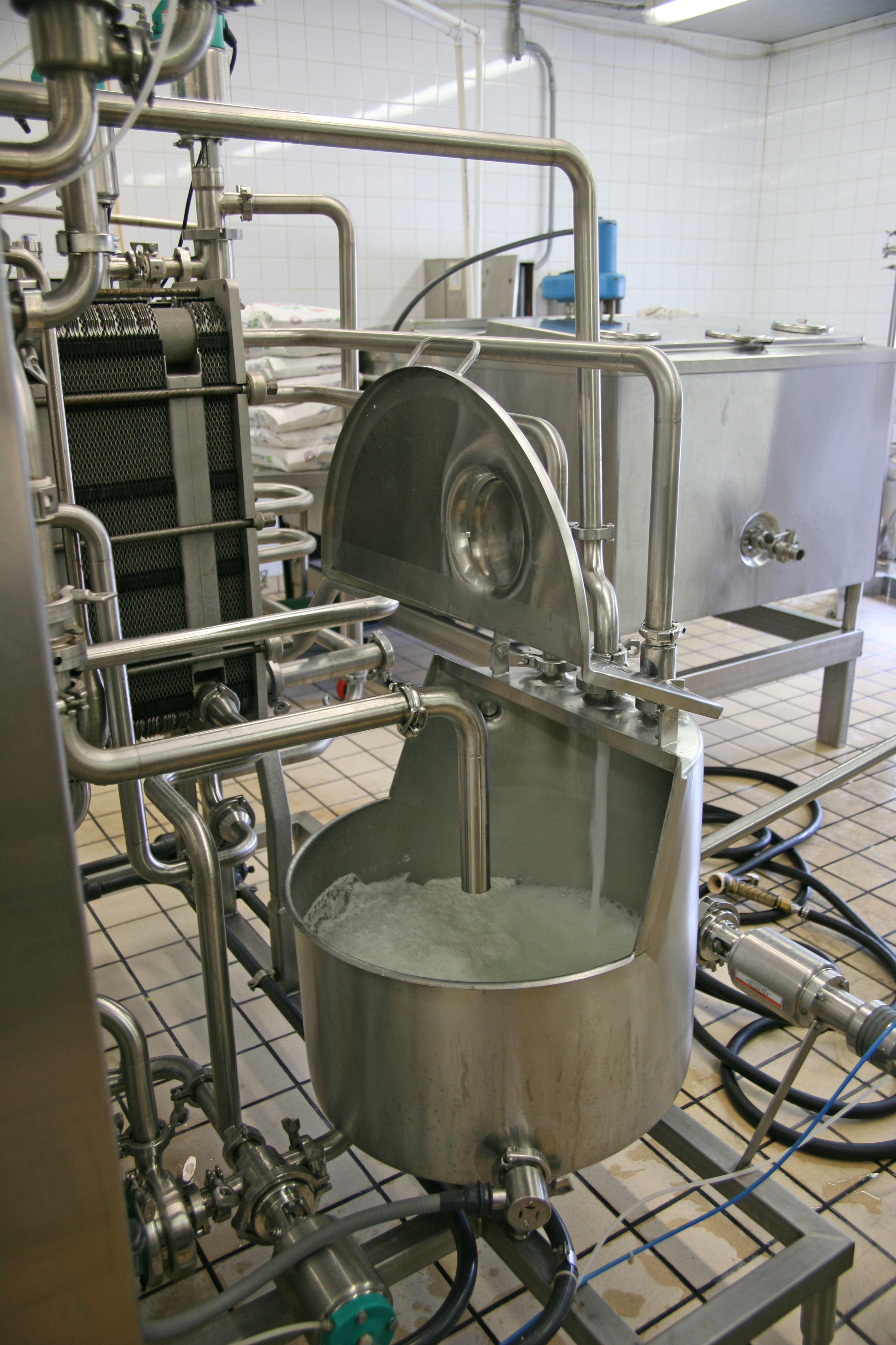 Here is raw milk going through the pasteurizer in the Hansen creamery. Our milk is pasteurized at 165 degrees for 15 seconds.